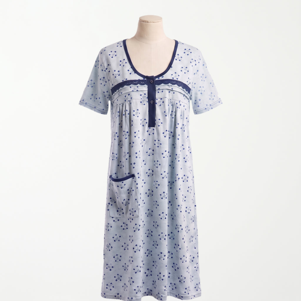 Bata clasica Azulina, celeste con florcitas azul marino y manga corta, vista completa