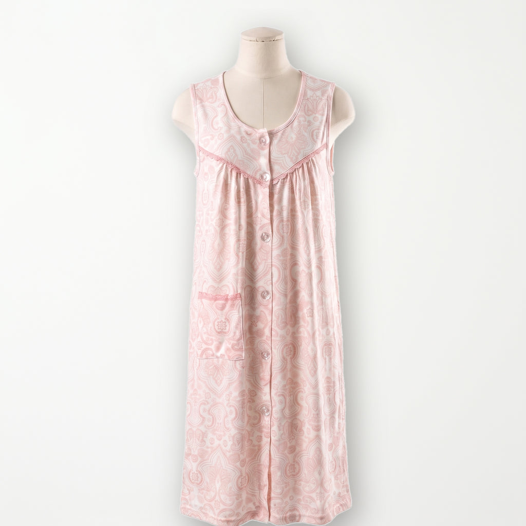 Bata clasica Camelia, crema con paisley rosa, sin mangas y abotonada entera, vista completa