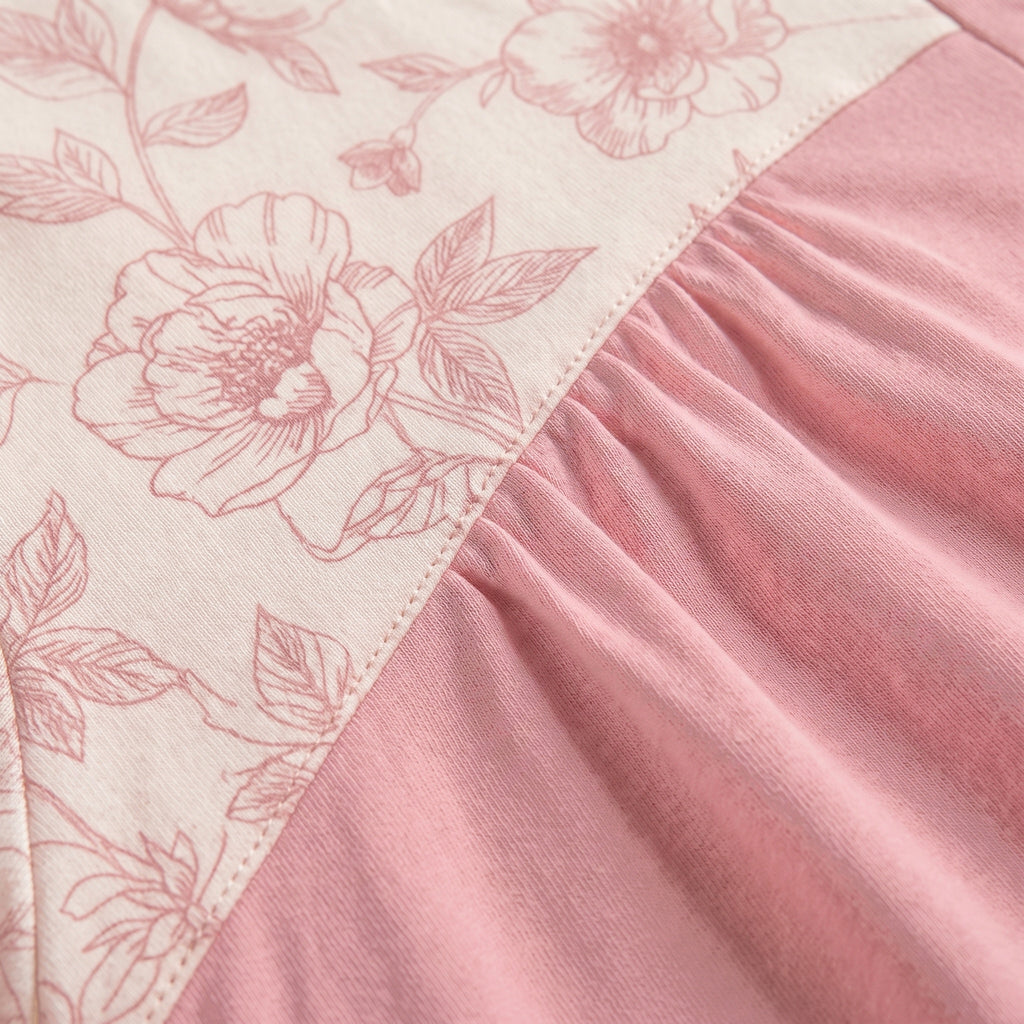 Bata Orquídea, la tela: canesú crema estampado, pespunte y frunce de la falda